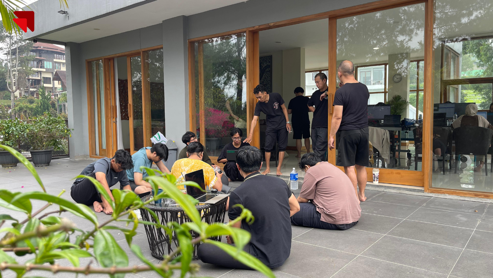 Close-up of Emveep engineers working in a serene outdoor environment during system optimization for school admissions.
